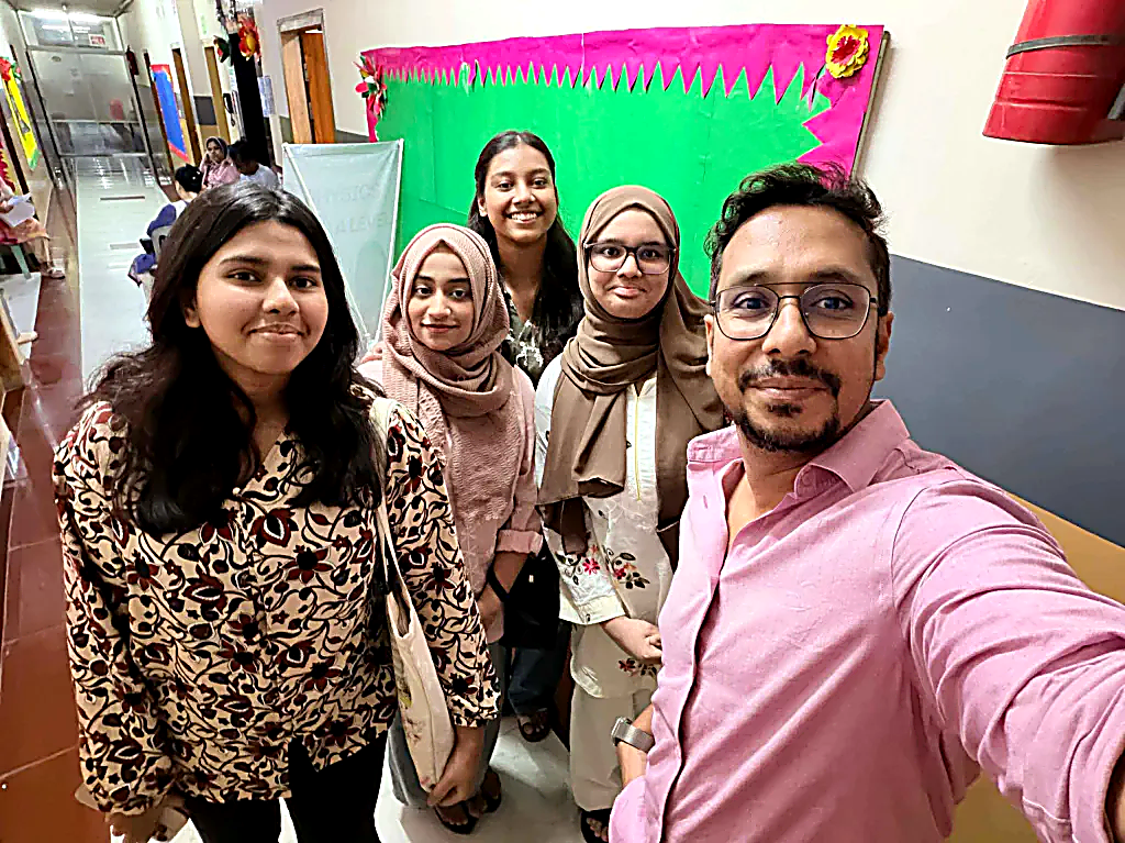 Sifat Uz Zaman with students